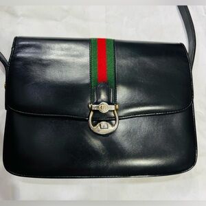 Gucci vintage black leather crossbody bag web accent.